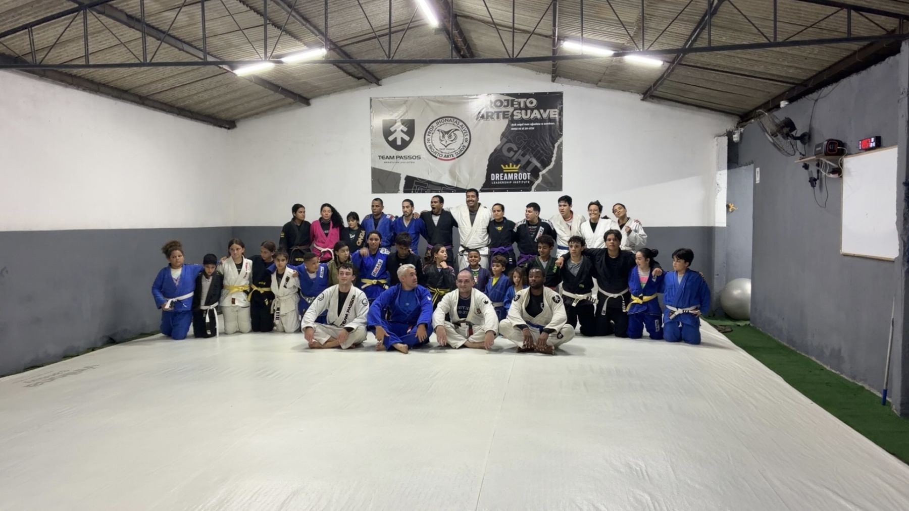 Academy members with Team Passos and Projeto Arte Suave students after training in Brazil